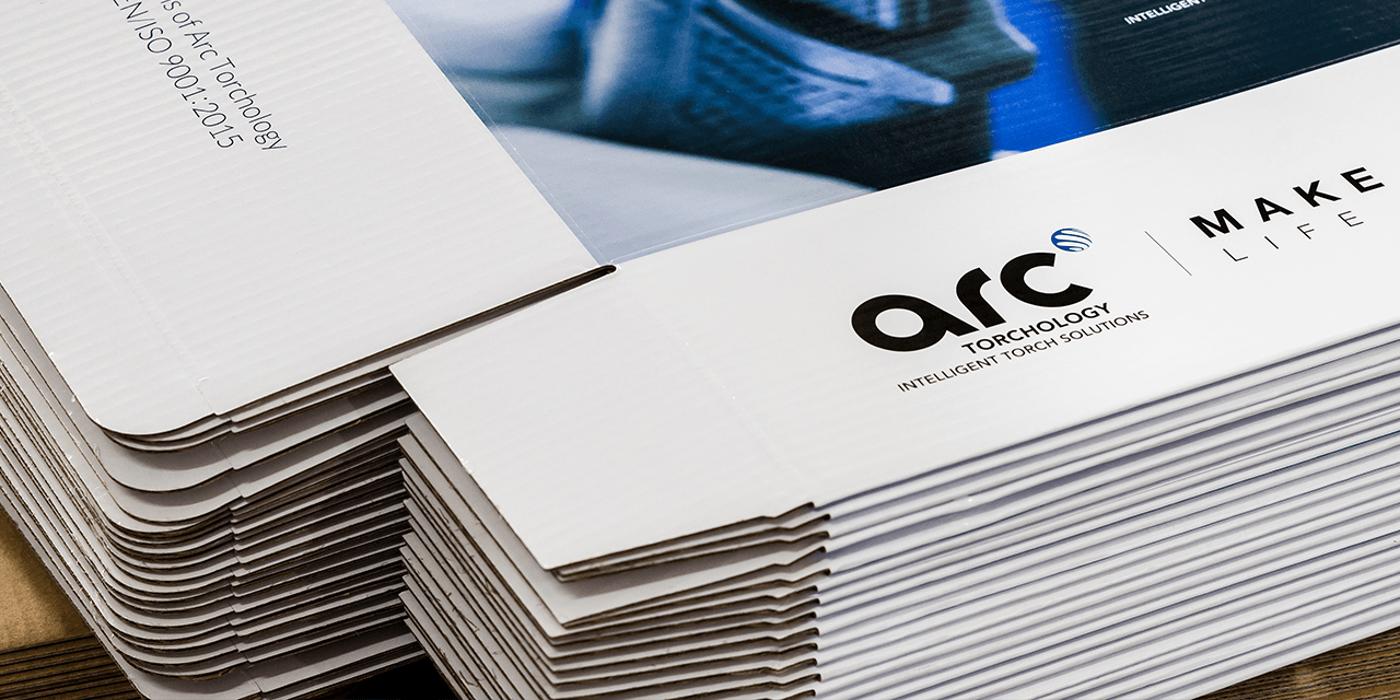 Stack of Arc Torchology welding torch boxes neatly arranged.